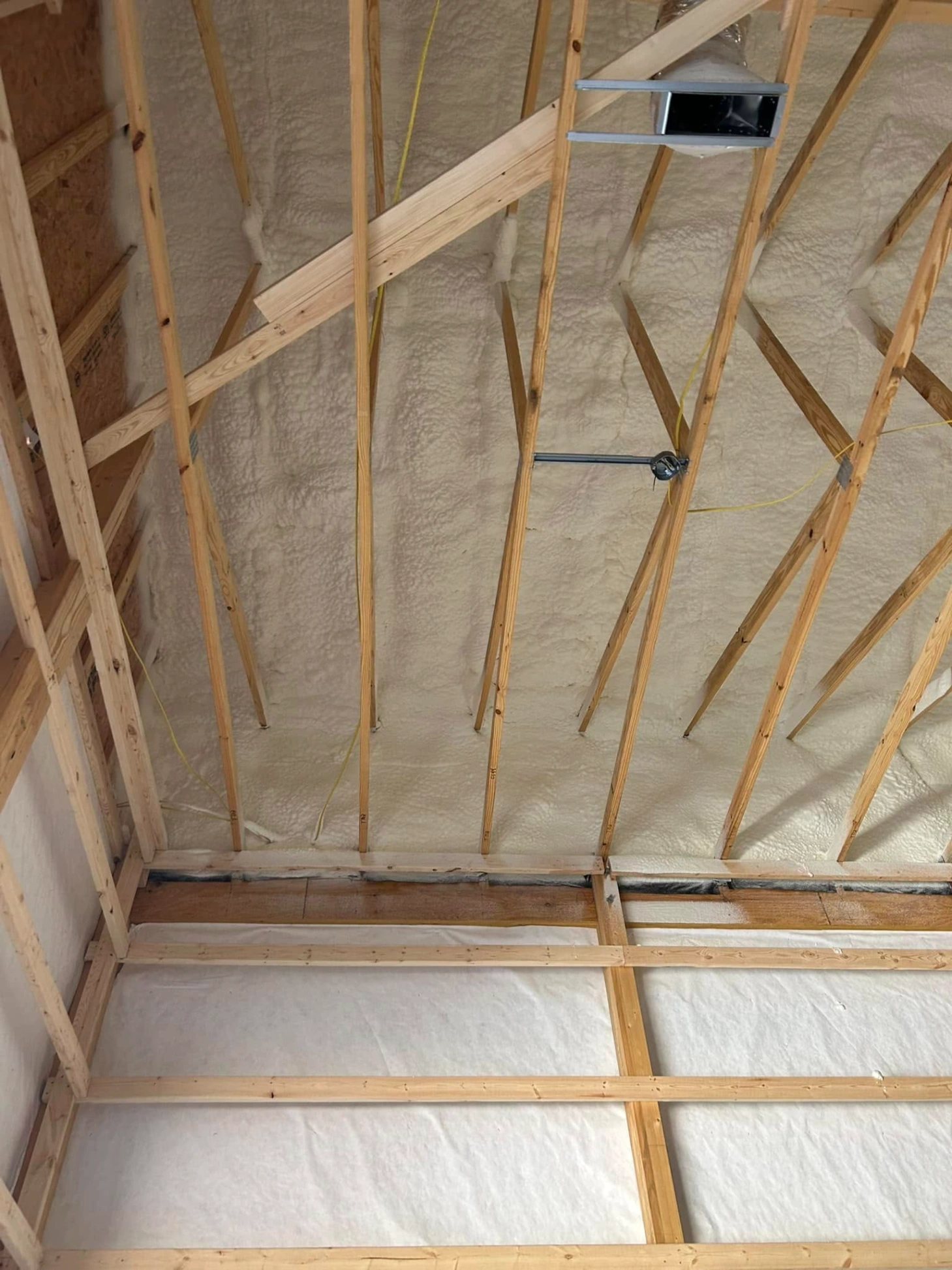 How Spray Foam Insulation Helps Prevent Roof Ice Dams